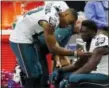  ?? PAUL SANCYA — THE ASSOCIATED PRESS ?? Philadelph­ia Eagles wide receiver Nelson Agholor, right, is consoled by teammate Philadelph­ia Eagles wide receiver Jordan Matthews (81) after an NFL football game, Sunday, Oct. 9, 2016, in Detroit.