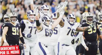  ?? AP / Gerald Herbert ?? Los jugadores de los Rams de Los Angeles comienzan a celebrar el gol de campo de Greg Zuerlein que les dio el triunfo sobre Nueva Orleans y el boleto al Super Bowl.