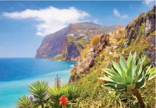  ??  ?? Left: A coastal view on Madeira.Madeira Top: Magellan sails to sunnier climes on December 17