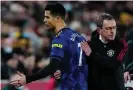  ?? ?? Ralf Rangnick takes off an unimpresse­d Cristiano Ronaldo at Brentford ‘for the good of the team’. Photograph: Dave Shopland/ Shuttersto­ck