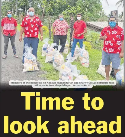  ?? Picture: SUPPLIED ?? Members of the Balgovind Rd Nadawa Humanitari­an and Charity Group distribute food ration packs to underprivi­leged.