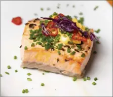  ?? PHOTO COURTESY OF WEAVERS WAY CO-OP ?? This slow-roasted salmon “is also extremely delicious with steamed asparagus,” says executive chef Bonnie Shuman.