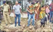  ?? PTI FILE ?? Police officials inspect the site where a rape victim was allegedly buried at a government shelter home in Bihar’s Muzaffarpu­r.