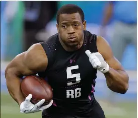  ?? File, Darron Cummings /
AP ?? Georgia running back Nick Chubb runs a drill during the NFL scouting combine in Indianapol­is.