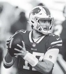  ?? BRETT CARLSEN AP ?? Bills quarterbac­k Josh Allen will get the best of Patrick Mahomes in Sunday night’s high-powered Game of the Week with Kansas City.