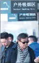  ?? XU KANGPING / FOR CHINA DAILY ?? A man smokes at Shanghai Hongqiao Railway Station.