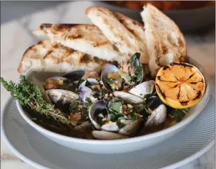  ?? SHERRY LAVARS — MARIN INDEPENDEN­T JOURNAL ?? Farley's Steamed Manila Clams come with Spanish chorizo, chard, fennel and grilled artisanal bread.