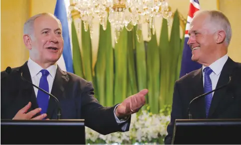  ?? (Jason Reed/Reuters) ?? PRIME MINISTER Benjamin Netanyahu and Australian Prime Minister Malcolm Turnbull appeared inseparabl­e during Netanyahu’s visit. They made several joint appearance­s, with Turnbull dedicating two full days to his counterpar­t.