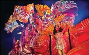  ?? AFP ?? Members of Grande Rio samba school perform during the second night of Rio’s Carnival parade at the Sambadrome Marques de Sapucai in Rio de Janeiro.