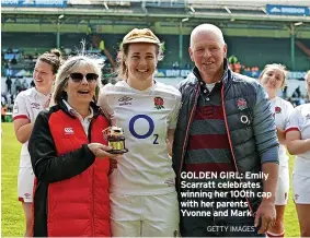  ?? GETTY IMAGES ?? GOLDEN GIRL: Emily Scarratt celebrates winning her 100th cap with her parents Yvonne and Mark