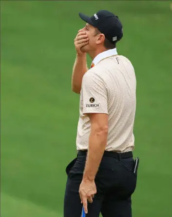  ?? Mike Ehrmann/Getty Images ?? Second-round leader Justin Rose reacts to a missed putt on the 10th hole Saturday, part of a round of 72 that left him four strokes out of the lead after starting the day one ahead.