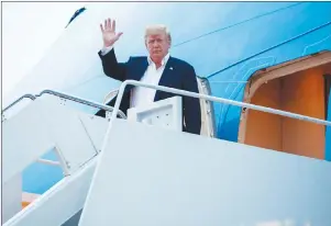  ?? AP PHOTO ?? U.S. President Donald Trump arrives at Andrews Air Force Base after a summit with North Korean leader Kim Jong Un in Singapore Wednesday.