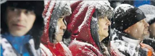  ?? TONY CALDWELL ?? These fans at the Grey Cup game, back on Nov. 26 at Lansdowne Park, would have been comfortabl­e as long as didn’t bundle up with too many layers and start to sweat.