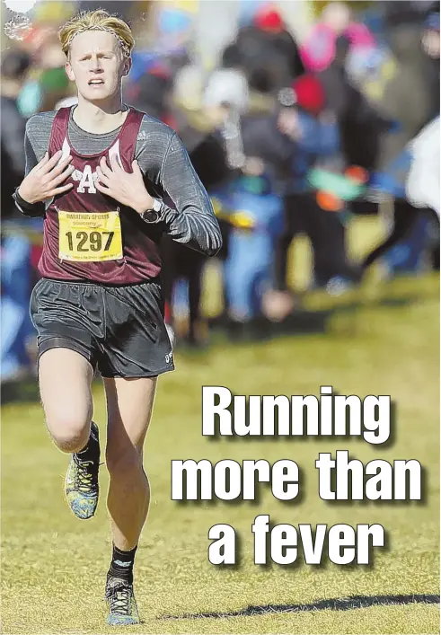  ?? HERALD FILE PHOTO BY JOSEPH PREZIOSO ?? AHEAD OF THE CROWD: Arlington’s Ryan Oosting — shown winning the 5K cross country championsh­ip in November — hopes to make amends for mononucleo­sis marring the end of last year’s fall campaign.