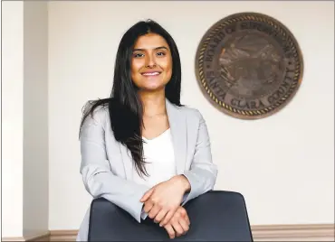  ?? GARY REYES — STAFF ?? Mitzia Martinez, 20, works for the County of Santa Clara as an intern for the New Americans Fellowship internship program in San Jose. She’s one of nearly 800,000young undocument­ed immigrants who have benefited from DACA.