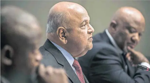  ?? Photo: Waldo Swiegers/Bloomberg ?? Political trap: Finance Minister Pravin Gordhan must trim costs and up social spending.