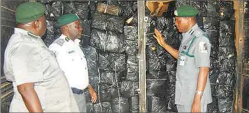  ??  ?? Customs Officers Showcasing sized goods