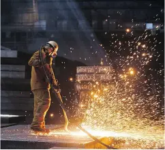  ?? ANDREY RUDAKOV / BLOOMBERG ?? U.S. tariffs may protect domestic steel producers, but they will raise costs for steel-dependent manufactur­ers, Joe Chidley writes.