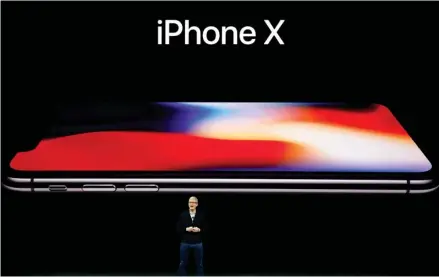  ?? (Photo by Marcio Jose Sanchez, AP) ?? Apple CEO Tim Cook announces the new iPhone X at the Steve Jobs Theater on the new Apple campus, Tuesday, Sept. 12, 2017, in Cupertino, Calif.