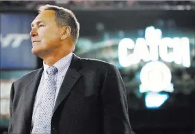  ?? THE ASSOCIATED PRESS FILE ?? Former 49ers wide receiver Dwight Clark is honored at halftime of a game against the Atlanta Falcons in December 2013 in San Francisco. Clark, who tweeted Sunday night that he has been diagnosed with ALS or Lou Gehrig’s disease, stands near the spot...