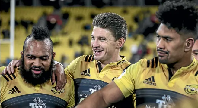  ?? GETTY IMAGES ?? Hurricanes cult hero Loni Uhila, brilliant No 10 Beauden Barrett and No 7 Ardie Savea celebrate after the Hurricanes’ win last night. The trio’s late season form has propelled the Hurricanes into next week’s final.