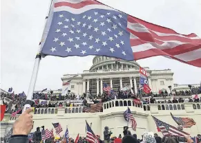  ?? THOMAS P. COSTELLO/ USA TODAY NETWORK ?? Protesters gather at the U. S. Capitol to protest the official election of Joe Biden on Wednesday.