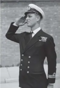  ??  ?? Philip, prior to his marriage to Princess Elizabeth, at the Royal Naval Officers School at Hawthorn, England, July 31, 1947