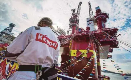 ??  ?? million, Keppel Corp’s year-on-year net profit was down 43 per cent to S$641
Bloomberg pic