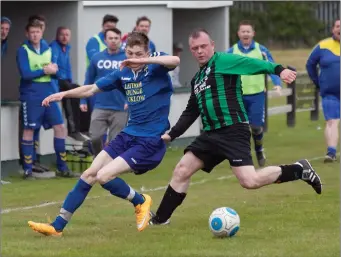  ??  ?? Eric Dunne of Wicklow Town and Alan Earls of Arklow United in a race for possession.
