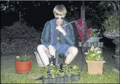  ?? LASTRHODES­IAN.COM ?? Killer Dylann Roof’s link to the Confederat­e flag prompted states across the South to remove the flag, leading to a backlash like the one in Douglas County.