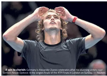  ??  ?? A win to cherish: Germany’s Alexander Zverev celebrates after his stunning victory over Serbia’s Novak Djokovic in the singles finale of the ATP Finals in London on Sunday. — Reuters