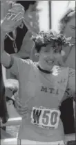  ??  ?? Rosie Ruiz waves to the crowd after receiving the laurel wreath as the winner of the Boston Marathon, although she would soon be exposed as a cheat for not completing the course giving the title to Canadian Jacqueline Gareau, 37 years ago today.