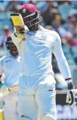  ??  ?? STEPPING UP: Carlos Brathwaite acknowledg­es the applause after scoring his 50.