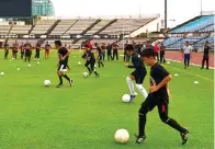  ??  ?? PELATIH AT Kota Kinabalu dijadikan model sesi latihan praktikal.