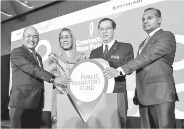  ??  ?? Guan Eng (second right) launching the Public Transport Fund in Kuala Lumpur yesterday.