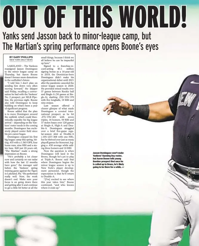  ?? AP ?? Jasson Dominguez won’t make Yankees’ Opening Day roster, but Aaron Boone tells young Bomber prospect that once he is called up to Bronx, he’s likely going to be there for a while.