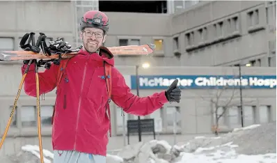  ?? CATHIE COWARD THE HAMILTON SPECTATOR ?? Dr. Michael Livingston skied to work Friday night when his car got stuck en route to emergency surgery.