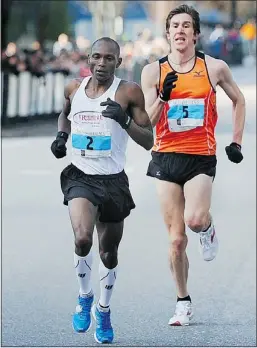 ?? — WAYNE LEIDENFROS­T — PNG FILES ?? Dylan Wykes (right) makes a final sprint past Kip Kangogo (left) in Vancouver last year.