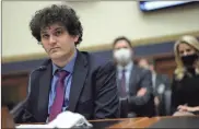  ?? Alex Wong/Getty Images/TNS ?? Sam Bankman-Fried testifies during a hearing before the House Financial Services Committee at Rayburn House Office Building on Capitol Hill on Dec. 8, 2021, in Washington, D.C.