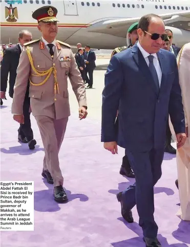  ?? Reuters ?? Egypt’s President Abdel Fattah El Sisi is received by Prince Badr bin Sultan, deputy governor of Makkah, as he arrives to attend the Arab League Summit in Jeddah