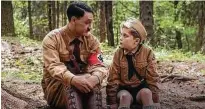  ?? Czech Anglo Production­s / Tribune News Service ?? Taika Waititi (left) and Roman Griffin Davis in “Jojo Rabbit,” which views WWII from a boy’s perspectiv­e.