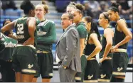  ?? Jessica Hill / Associated Press ?? Coach Jose Fernandez’s South Florida team has been decimated by injuries.