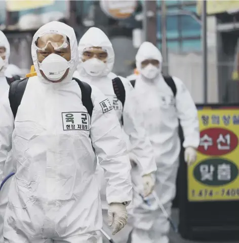  ??  ?? of preventive measures against the spread of the Covid-19 coronaviru­s at a market in Daegu