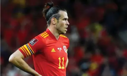  ?? ?? Gareth Bale on the pitch for Wales during his last game, the goalless draw with Estonia in early September. Photograph: Rebecca Naden/ Reuters