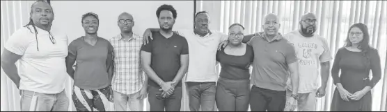  ?? ?? New GAPLF President, Franklin Wilson (center) flanked by Executive Committee Members from left, Roger Rogers, Keisha Abrigo, Maxwell Denny, DenroyLiva­n, Zanele Chase, Henry Chase, Farouk Abdool and Returning Officer, Mrs. Vidushi Persaud-McKinnon