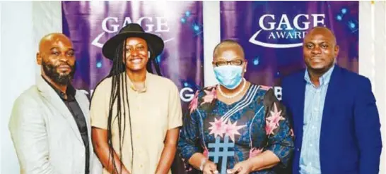  ??  ?? L-R: Johnson Anorh, chief administra­tor, GAGE Awards ; Nicole Adehi. member, communicat­ions team, GAGE Awards; Oby Ezekwesili of BBOG; and Yomi Olaniwun, head. s strategy and communicat­ions, GAGE Awards, during the presentati­on of GAGE Award to Oby Ezekwesili for the social movement of the year 2020 with Bring Back Our Girls