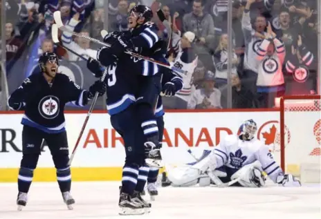  ?? BRUCE FEDYCK/USA TODAY SPORTS ?? With his hat trick against the Leafs on Wednesday, Jets rookie Patrik Laine (No. 29) has four goals and one assist in his first four games in the NHL.