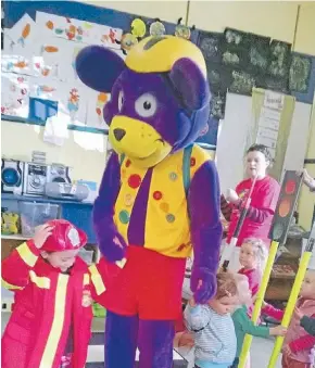  ??  ?? Safety first: Ruben the Road Safety Bear visits preschoole­rs at Porse Morrinsvil­le. Porse childhood education centres are part of the Evolve roll-up and listing.