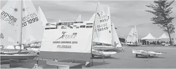  ??  ?? Some of the sail boats parked at the competitio­n venue while waiting for stronger wind to start sail.