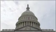  ?? SUSAN WALSH — THE ASSOCIATED PRESS ?? In this photo taken in February, a flag flies on Capitol Hill in Washington.